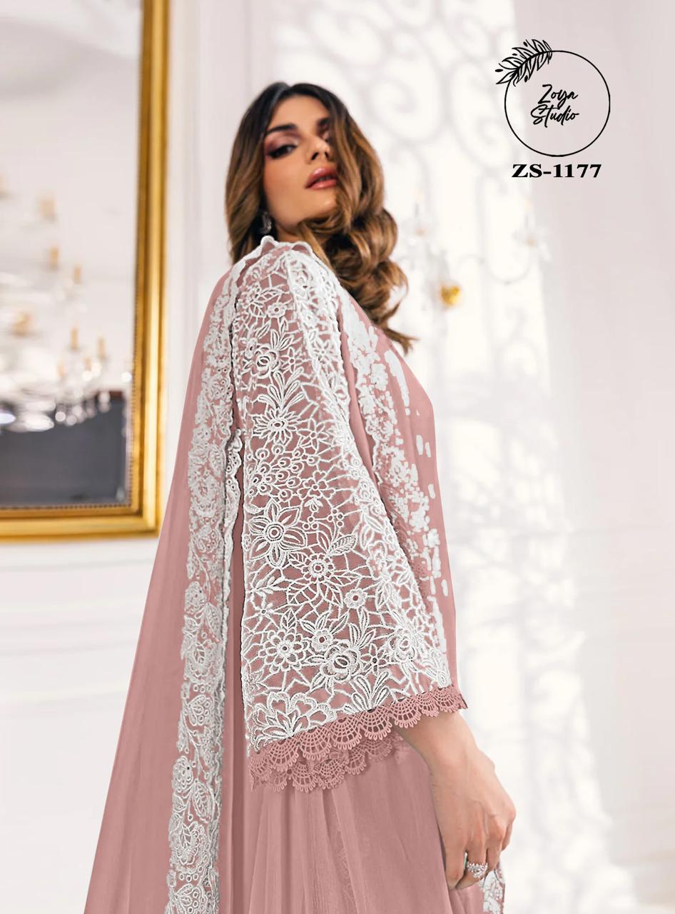 This beautiful Blue nd Purple outfit is rendered on a Organza base and features a straight shirt enlivened by intricate embroidery details on the front and sleeves