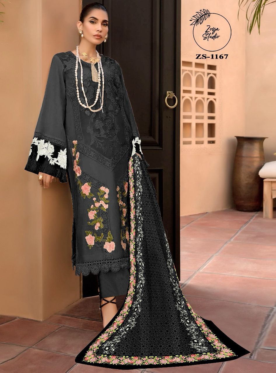 Midnight Noir, in off-white and black, features a Georgotte Top, Digital Print duppata, and Streachble pants. Embellished with a striking cutwork panel and mesmerizing dimonties spray
