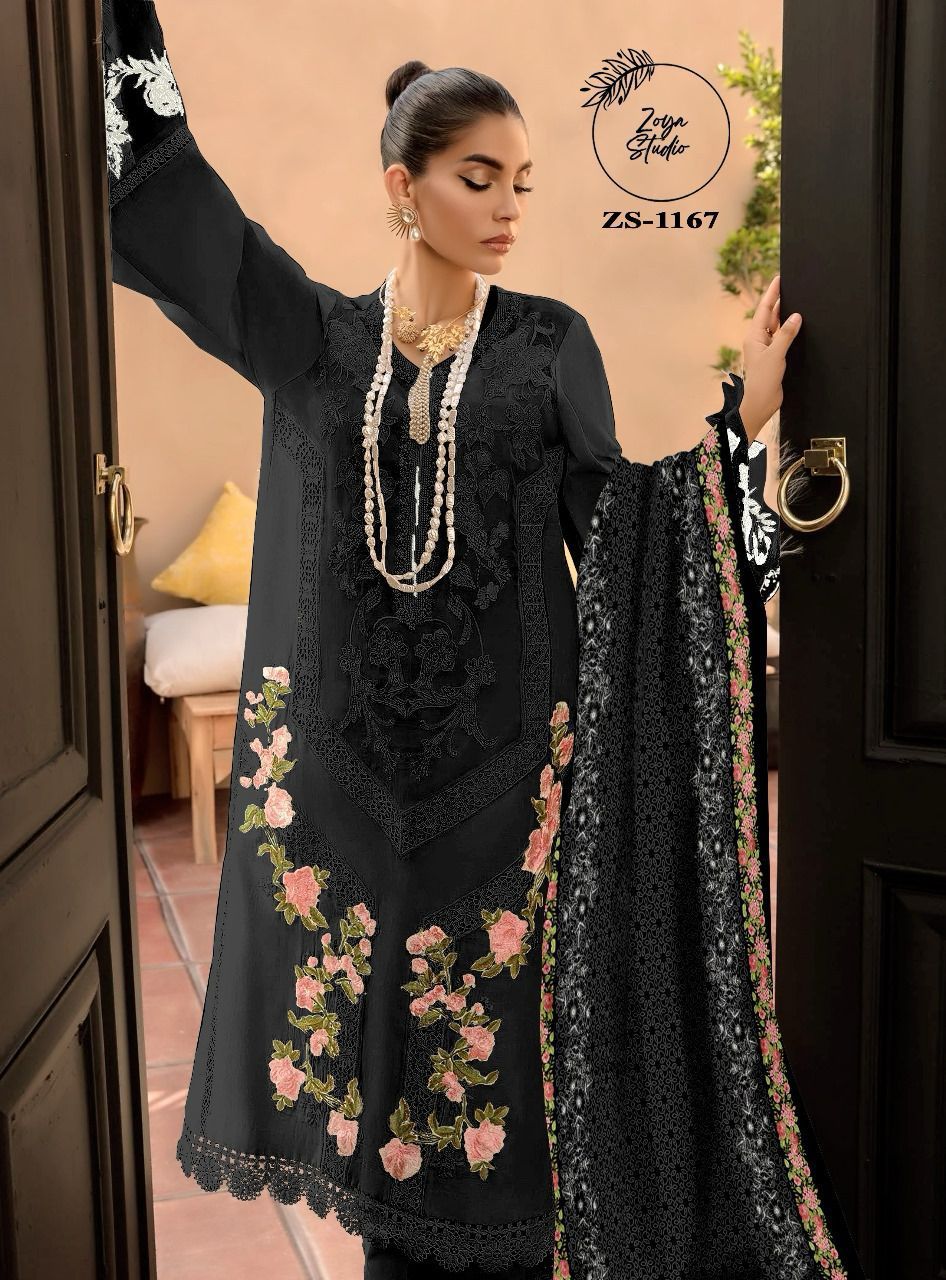 Midnight Noir, in off-white and black, features a Georgotte Top, Digital Print duppata, and Streachble pants. Embellished with a striking cutwork panel and mesmerizing dimonties spray