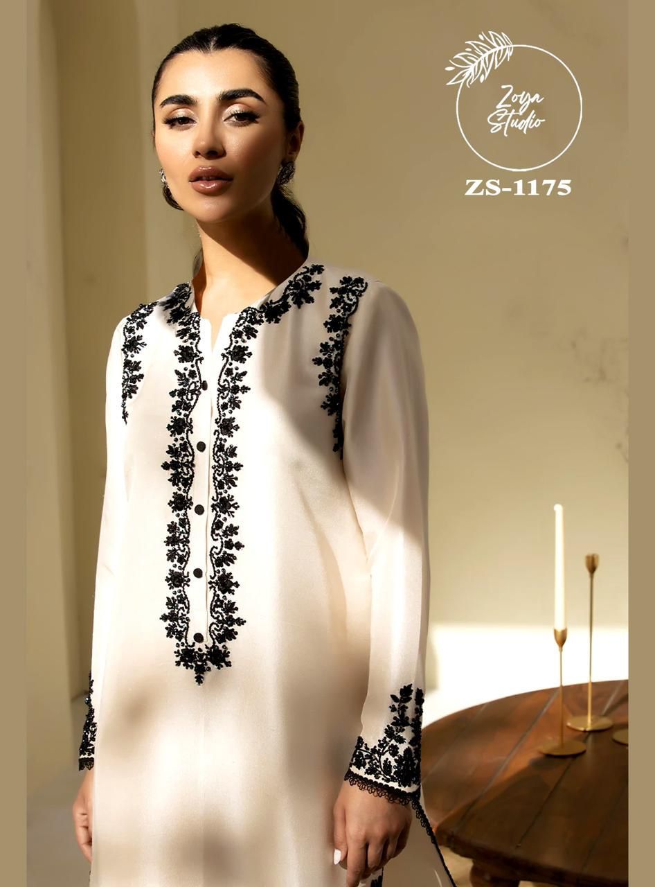 Designer stylish Embrdry Tunic With Beautiful Neck With Stylish Look & also Embrdry In Sleeves & in Pants