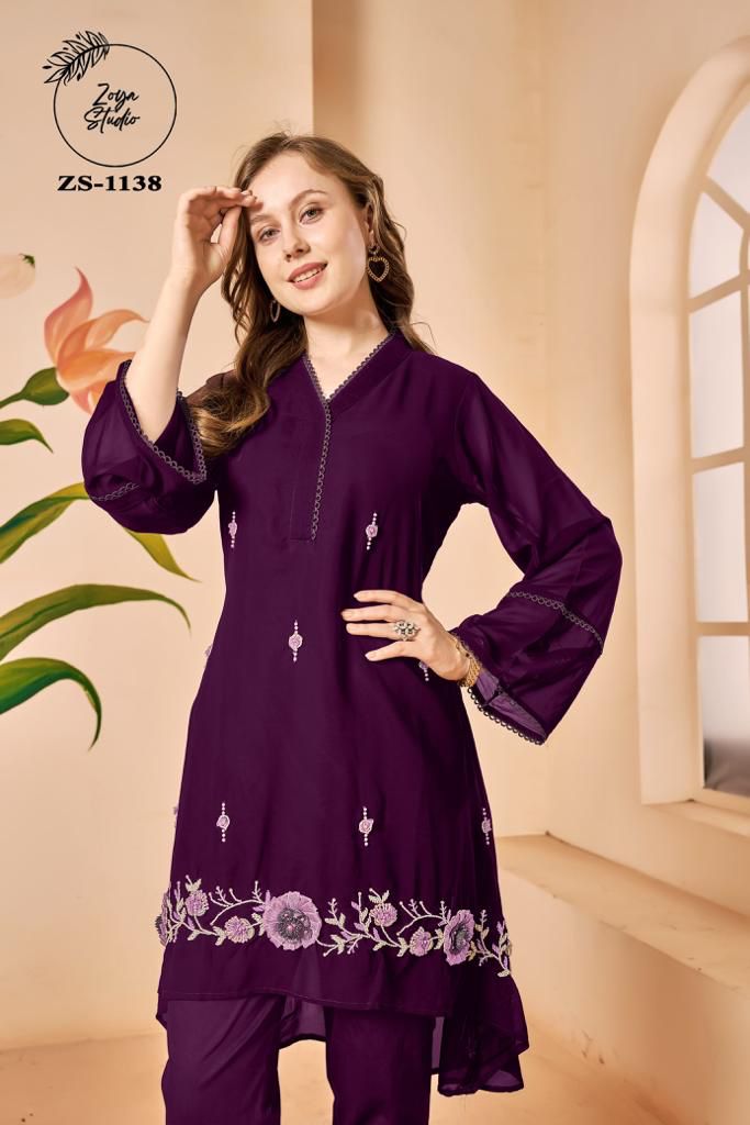 Designer Tunic with Gorgeous Handwork & sleeves In Pattern Glamours Tassels paired with Classy pants