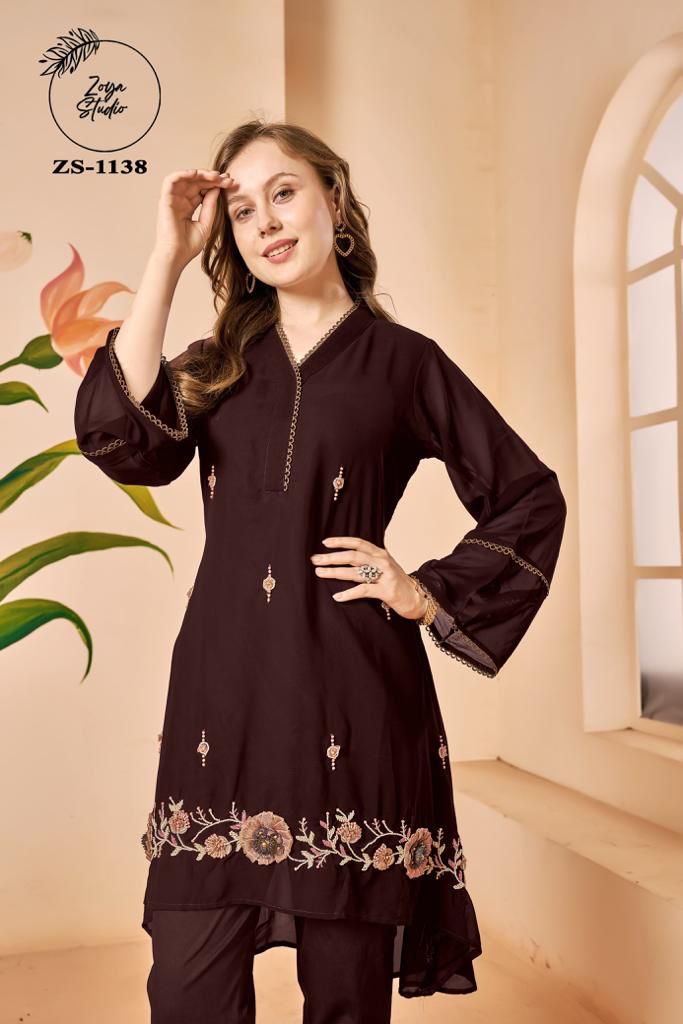Designer Tunic with Gorgeous Handwork & sleeves In Pattern Glamours Tassels paired with Classy pants