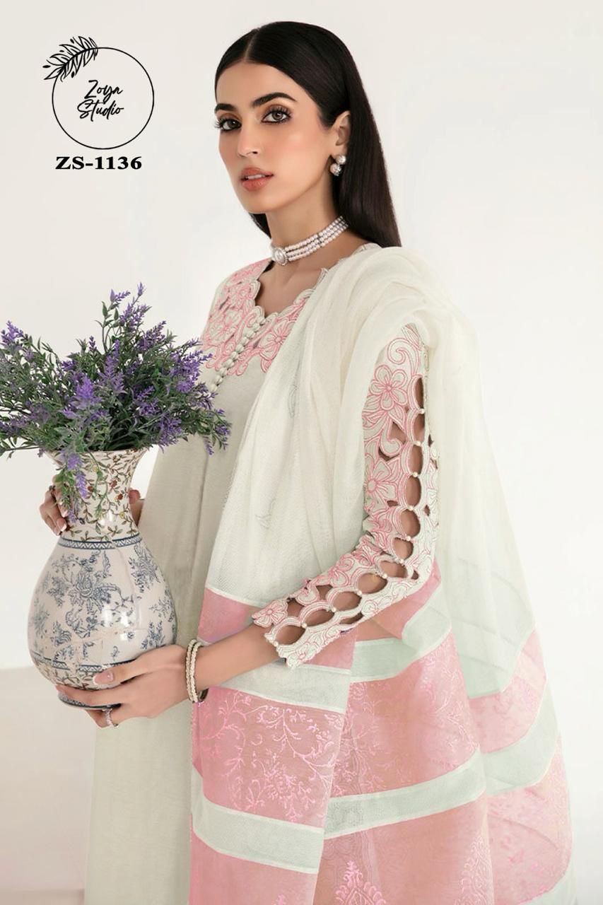 Georgotte straight shirt with heavy embroidered cutwork details beautifuly composed all over the shirt and sleeves with scalloped edging and sleek straight cut button down neckline