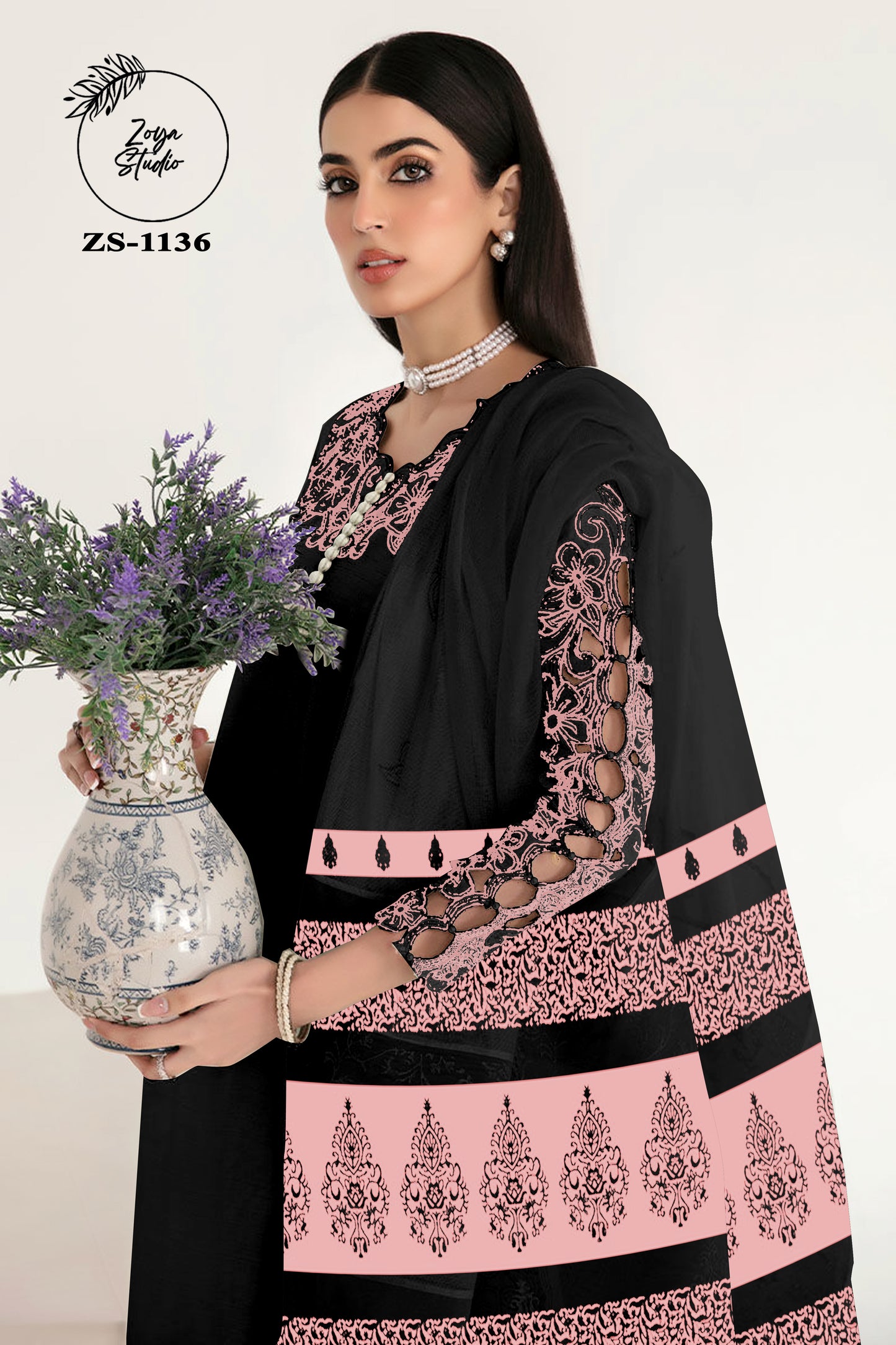 Georgotte straight shirt with heavy embroidered cutwork details beautifuly composed all over the shirt and sleeves with scalloped edging and sleek straight cut button down neckline