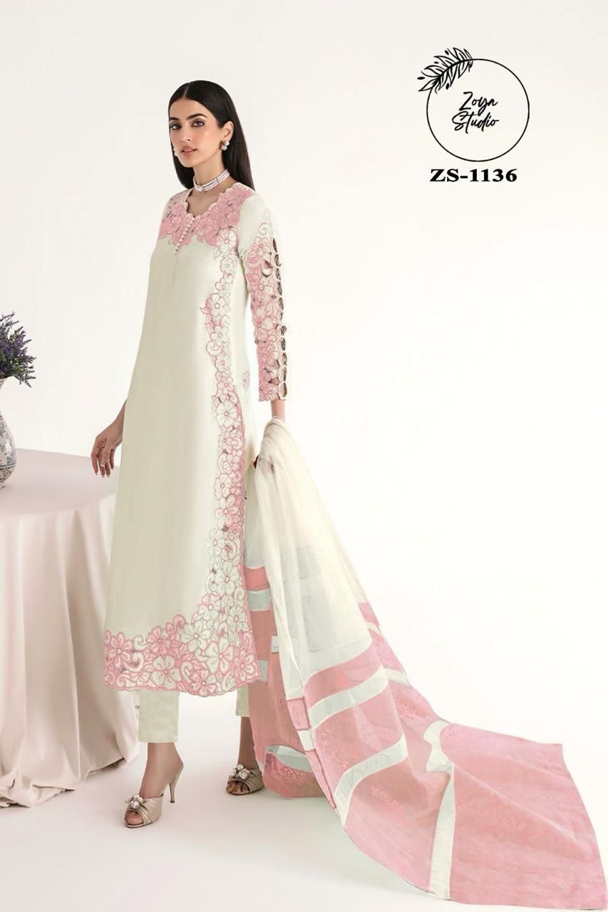 Georgotte straight shirt with heavy embroidered cutwork details beautifuly composed all over the shirt and sleeves with scalloped edging and sleek straight cut button down neckline