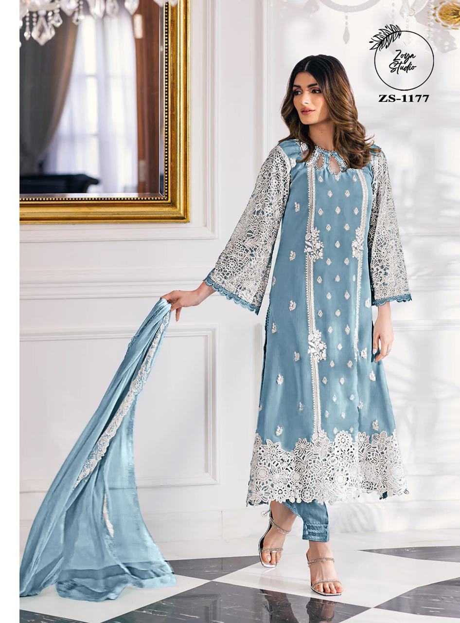 This beautiful Blue nd Purple  outfit is rendered on a Organza base and features a straight shirt enlivened by intricate embroidery details on the front and sleeves