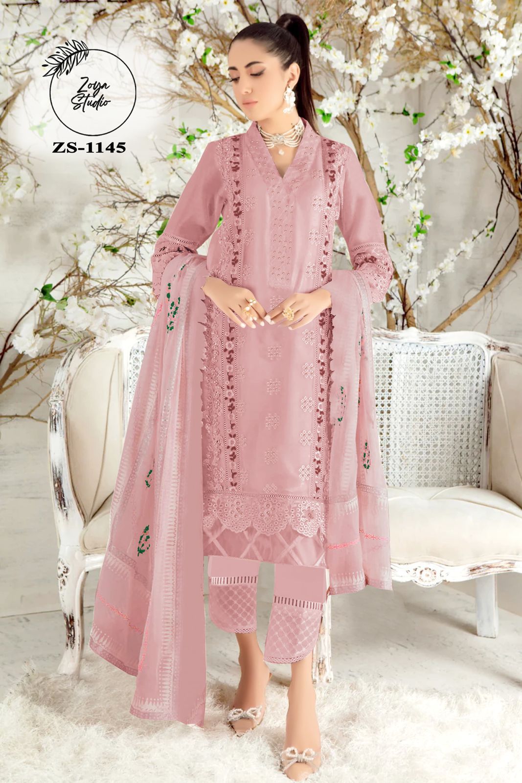 Cut from breathable embroidered Georgette, this heavenly pink Peach Nd Blue Color simple silhouette kurta features cross stitch colorful silk thread work along with panel & sleeves